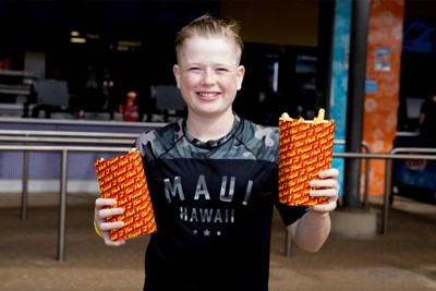 Child enjoying combo meal