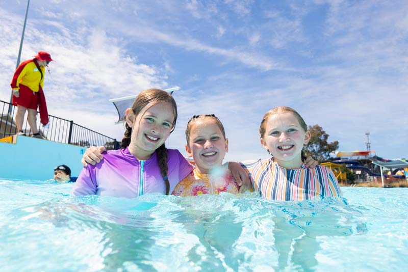 Friends in wave pool